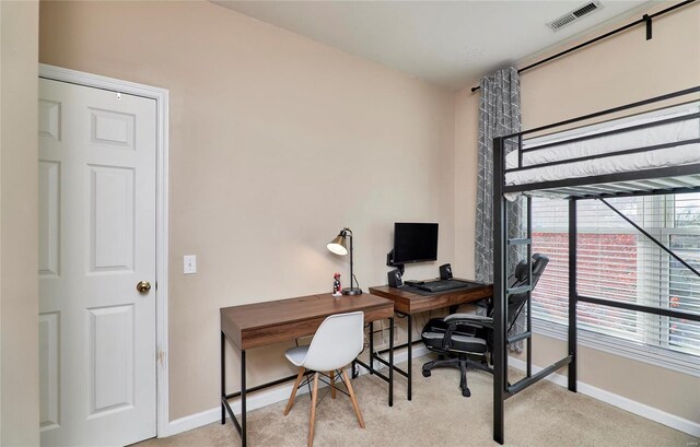 view of carpeted office space