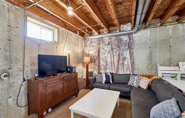 living room with concrete flooring