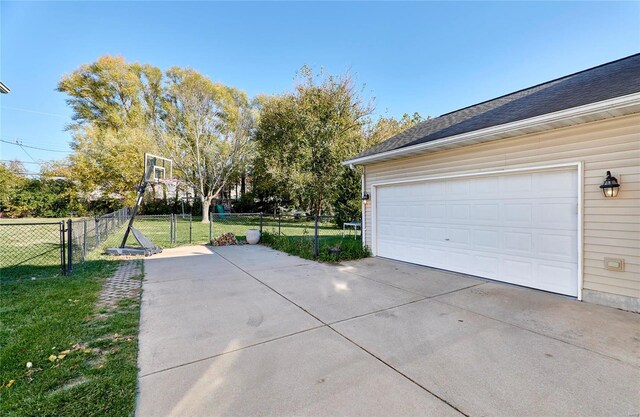 garage with a yard