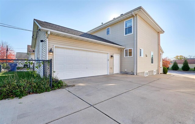 view of home's exterior with a garage