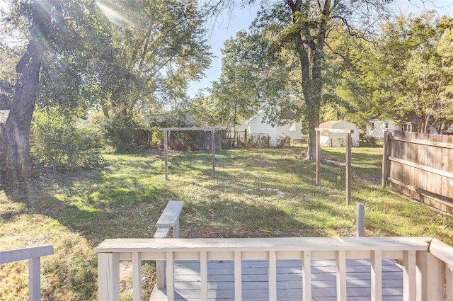 view of yard featuring a wooden deck