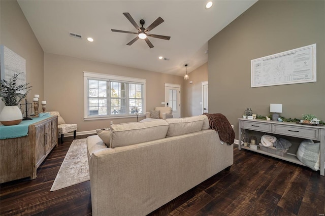 living room with ceiling fan, dark hardwood / wood-style floors, and high vaulted ceiling