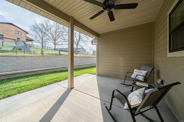 view of patio / terrace featuring ceiling fan