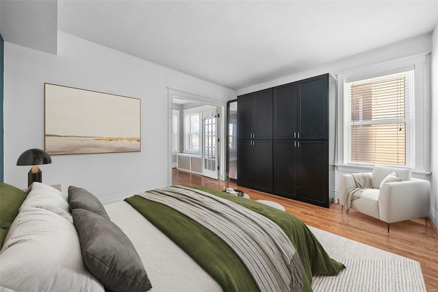 bedroom featuring wood-type flooring