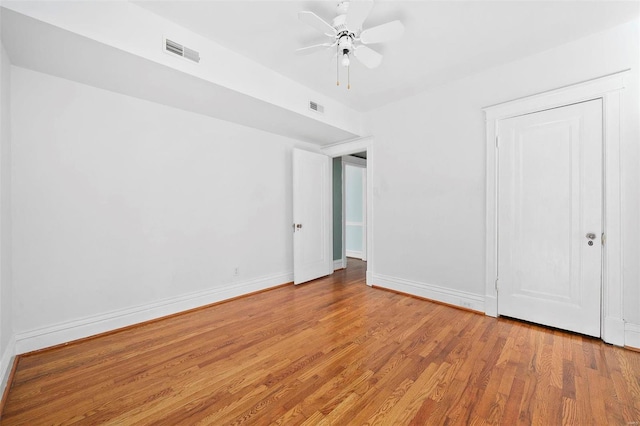 unfurnished bedroom featuring ceiling fan and light hardwood / wood-style floors