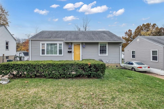 view of front of home with a front yard