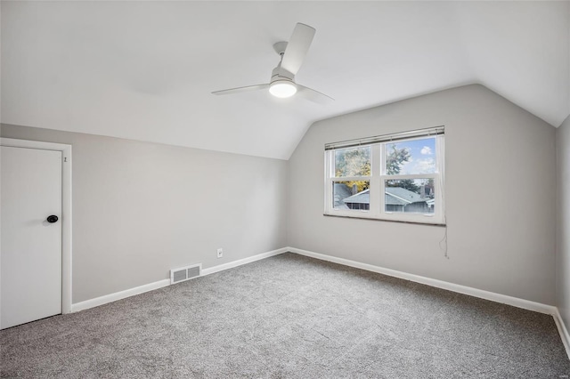 bonus room featuring carpet, ceiling fan, and vaulted ceiling