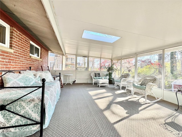 sunroom / solarium featuring a skylight