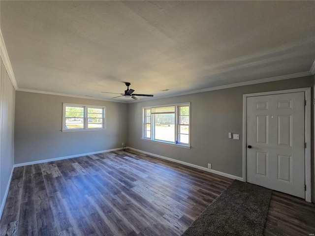 unfurnished room featuring a textured ceiling, dark hardwood / wood-style floors, ceiling fan, and crown molding