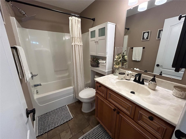 full bathroom featuring shower / bath combo, vanity, toilet, and tile patterned floors