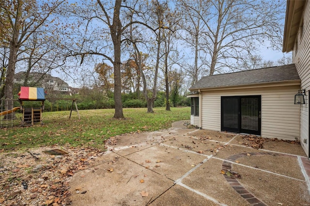 view of patio featuring a playground