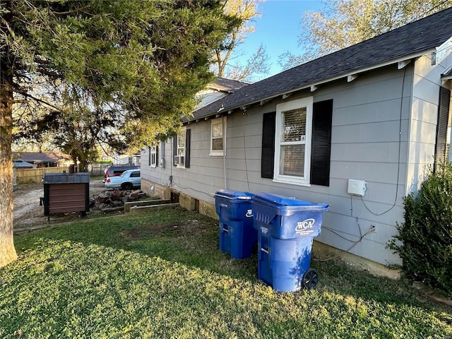 view of property exterior with a lawn