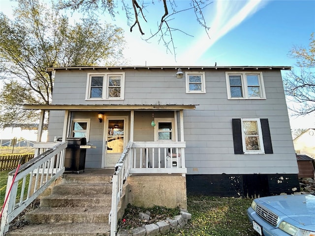 view of front of home featuring covered porch