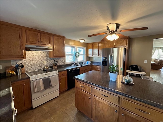 kitchen featuring dishwasher, sink, stainless steel refrigerator with ice dispenser, tasteful backsplash, and white electric range oven