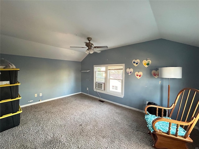 sitting room featuring ceiling fan, cooling unit, carpet floors, and vaulted ceiling