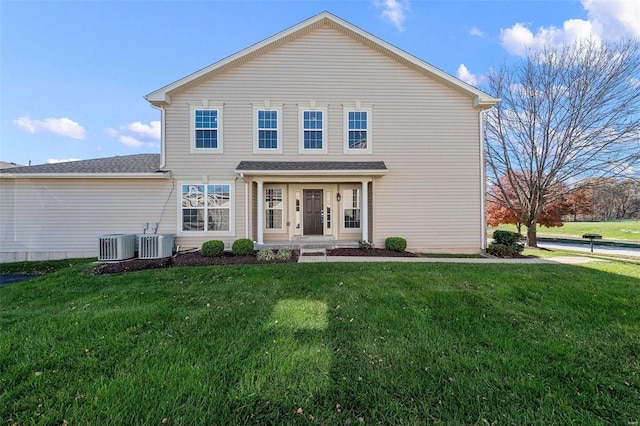 exterior space with central AC and a front lawn