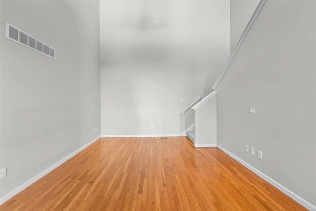 unfurnished living room with light wood-type flooring