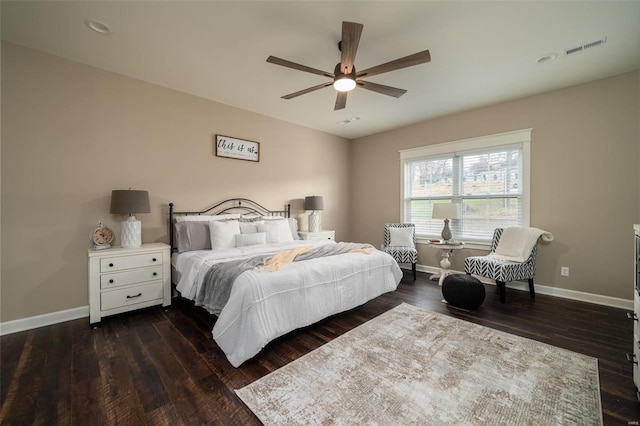 bedroom with dark wood-type flooring and ceiling fan