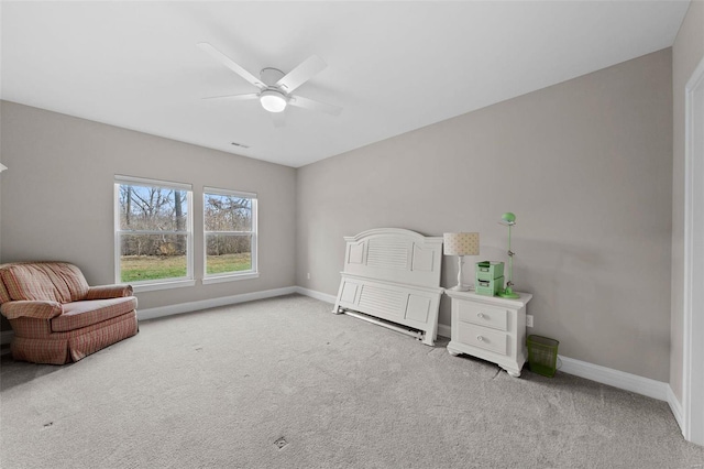 unfurnished bedroom featuring ceiling fan and carpet flooring