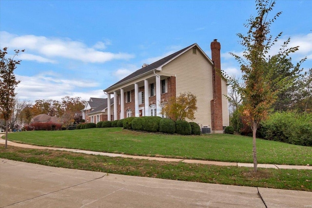 view of home's exterior featuring a yard