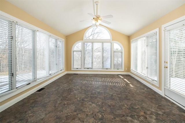 unfurnished sunroom with vaulted ceiling and ceiling fan