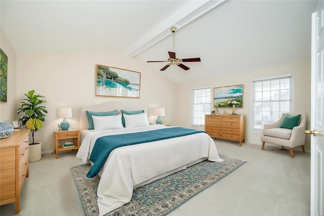 carpeted bedroom with lofted ceiling with beams and ceiling fan