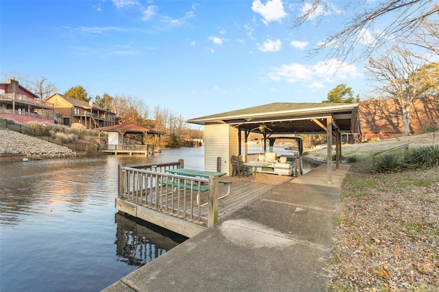 view of dock with a water view