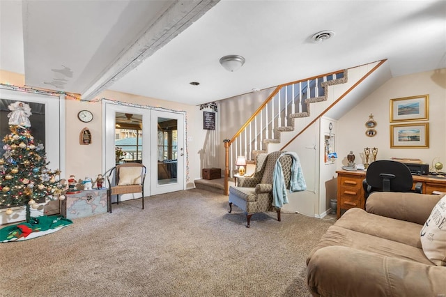 carpeted living room with vaulted ceiling with beams and french doors