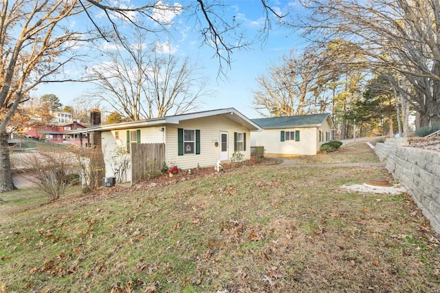 exterior space with a front lawn