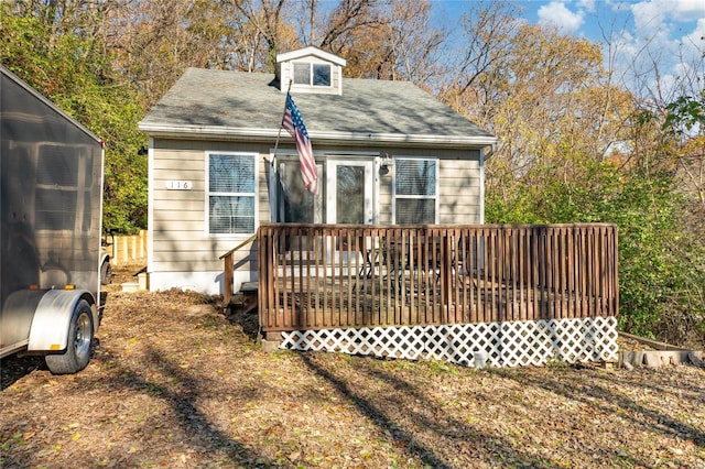 view of front of home with a wooden deck