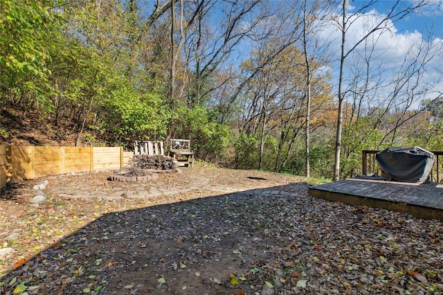 view of yard featuring a wooden deck