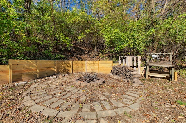 view of patio / terrace featuring a fire pit