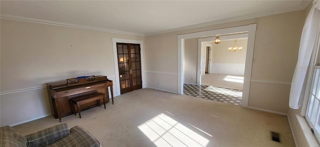 misc room with a chandelier, light colored carpet, and crown molding