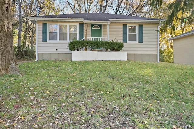 view of front of property with a front lawn