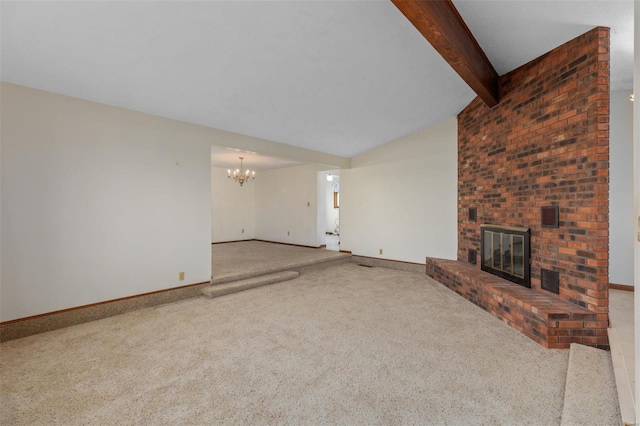 unfurnished living room with carpet flooring, a brick fireplace, lofted ceiling with beams, and a chandelier