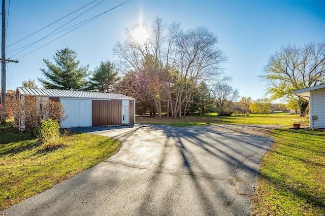 garage with a yard