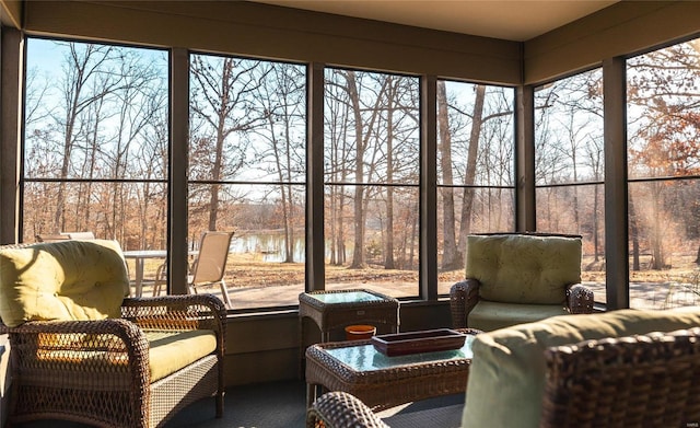 sunroom with a water view