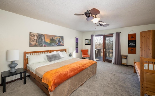 bedroom featuring ceiling fan, carpet flooring, access to exterior, and a textured ceiling