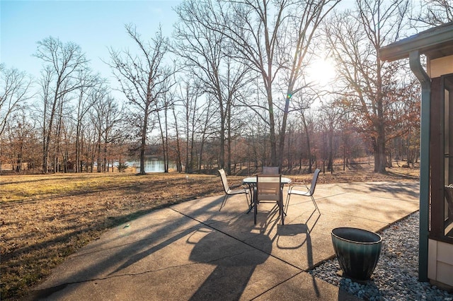 view of patio / terrace with a water view