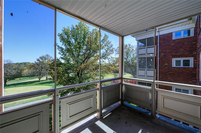 unfurnished sunroom with plenty of natural light