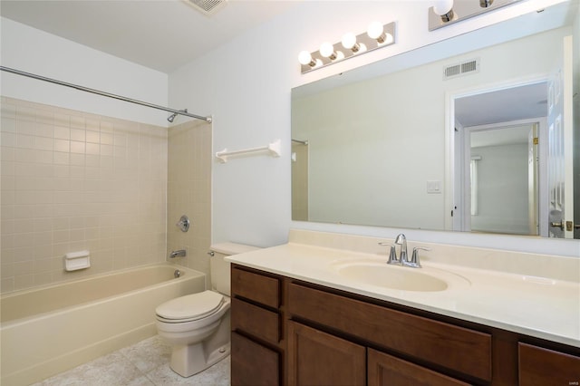 full bathroom featuring tile patterned flooring, vanity, tub / shower combination, and toilet