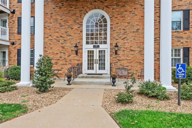 property entrance featuring french doors