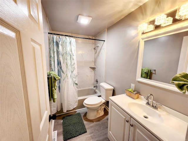 full bathroom featuring shower / bath combo with shower curtain, vanity, wood-type flooring, and toilet