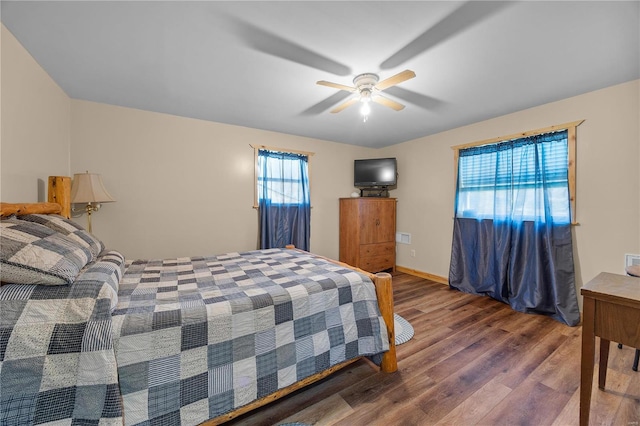 bedroom featuring hardwood / wood-style flooring and ceiling fan