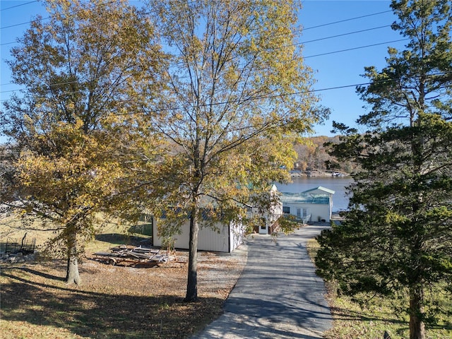 view of property hidden behind natural elements