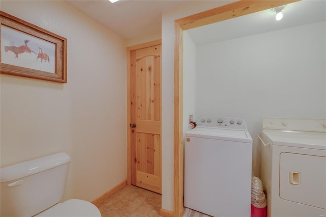 interior space with separate washer and dryer and light tile patterned floors