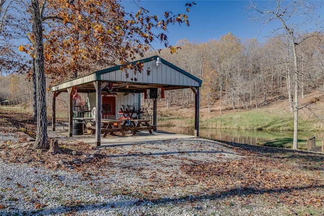 view of outbuilding with a water view