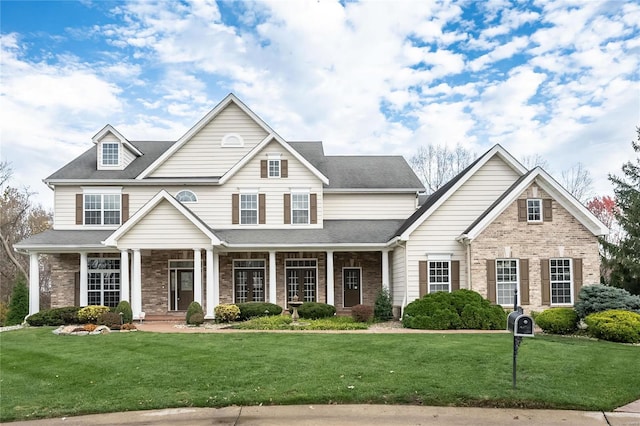 view of front of home with a front lawn