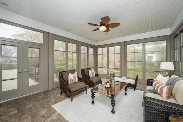 sunroom with ceiling fan and french doors