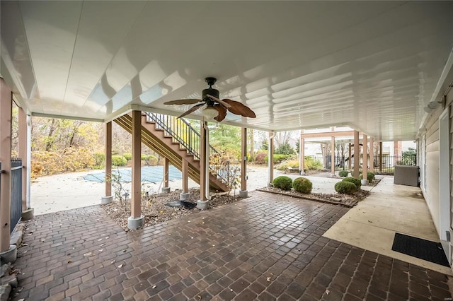 view of patio featuring ceiling fan